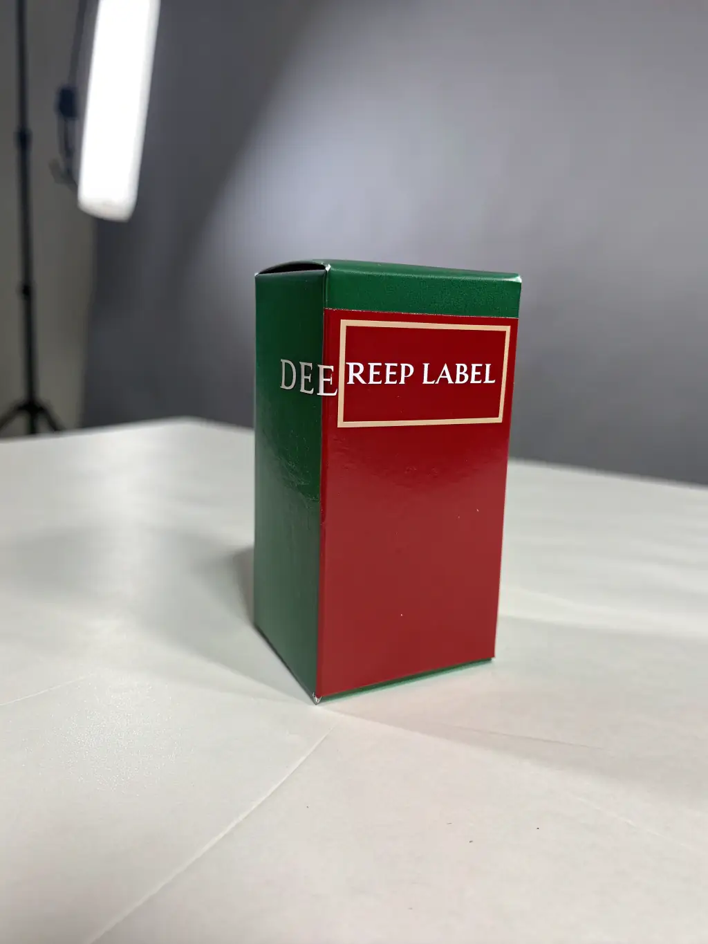 A photograph of a beautifully designed product package with minimalist typography and clean lines, reflecting Studio Kreska's expertise in creating visually appealing and functional package designs.